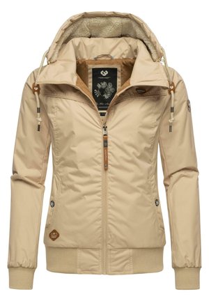 Veste isolante beige avec fermeture éclair, doublure de capuche texturée, cordons de serrage et accents en cuir. Comprend des poignets et des poches latérales.