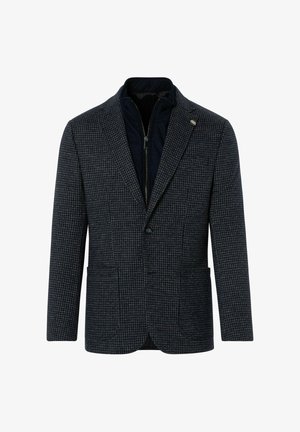 Marineblauwe houndstooth blazer met een rits binnenlaag en gekartelde kraag. Beschikt over twee voorzakken en een knoopsluiting. Getextureerde stof.