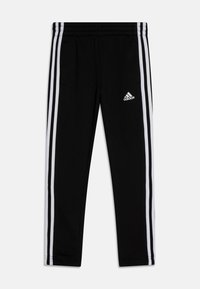 Schwarze Sporthosen aus weichem Material mit weißen Seitenstreifen und einem gestickten Adidas-Logo auf dem linken Oberschenkel. Inklusive elastischem Bund.