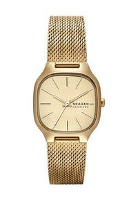 Gold mesh wristwatch with a square case, light gold face, slim hour markers, and a minimalist design. Brand name "SKAGEN" featured.