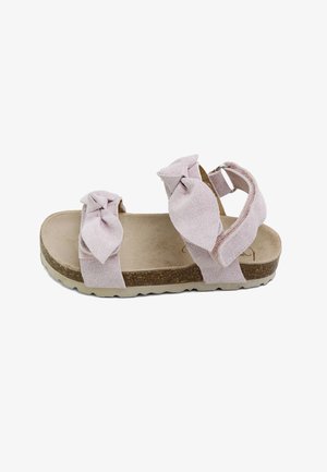 Sandalia de ante rosa para niño con dos tiras anudadas, plantilla de corcho, tira ajustable en el tobillo y suela beige con dibujo antideslizante.