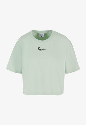 Mündroheline lühikeste varrukatega t-särk, mis on valmistatud pehmest puuvillast. Sellel on ümar, avar kaelus ja must logo trükitud esiküljele.