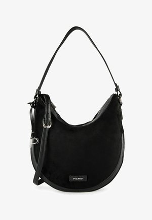 Sac d'épaule noir en forme de croissant avec des bretelles en cuir réglables, fermeture éclair et étiquette "PICARD" à l'avant.