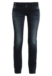 Smala jeans i mörkblå denim med en midjehöjd av medelhöjd, fem fickor, subtil blekning och kontrasterande sömmar längs kanterna.
