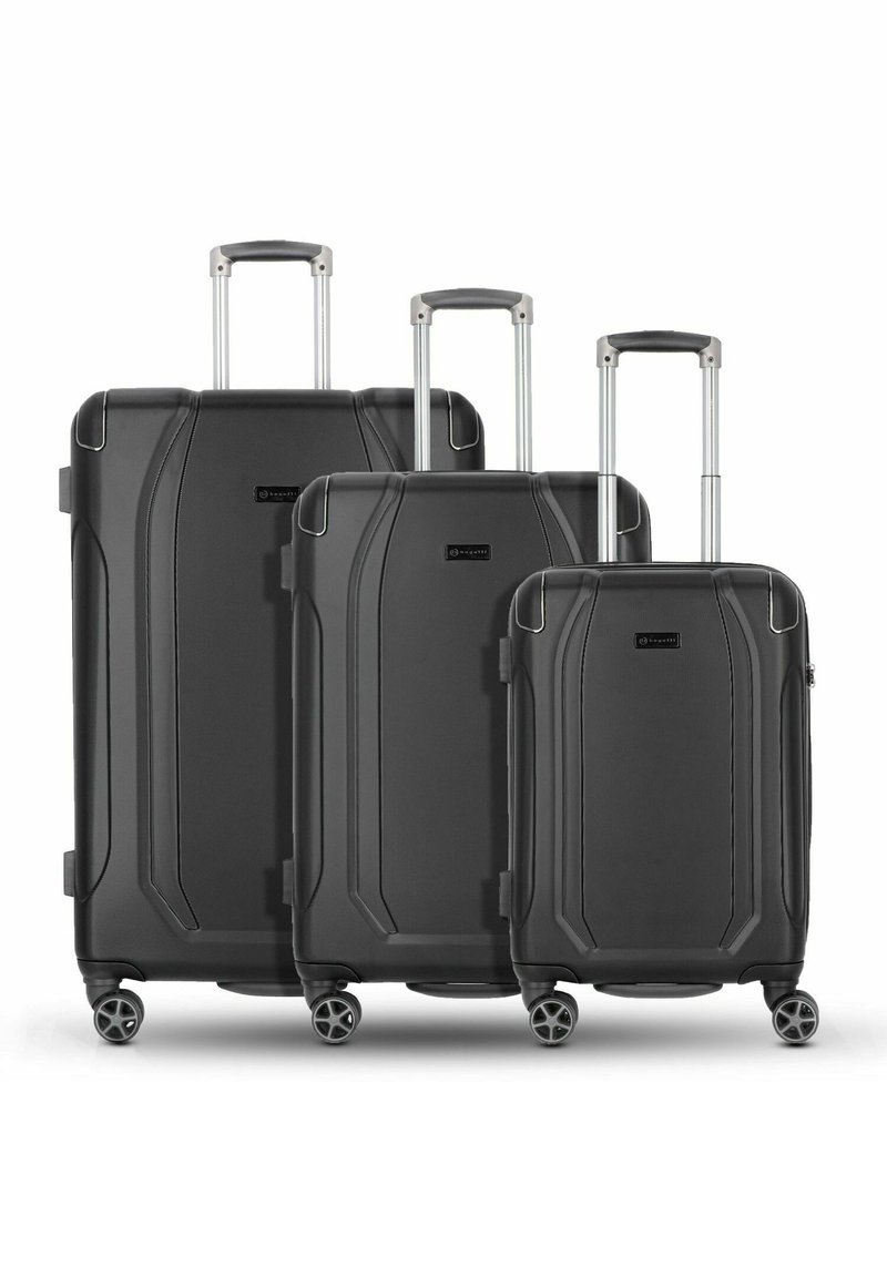 Tre valigie rigide nere di diverse dimensioni, con contorni eleganti, manici telescopici e ruote girevoli a 360 gradi.