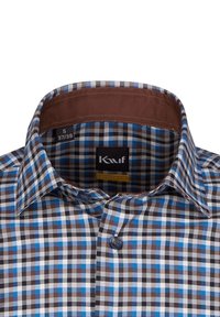 Camicia a quadri marrone, blu e bianca con colletto marrone uniforme, chiusura con bottoni e un'etichetta che indica la taglia S (37/38).
