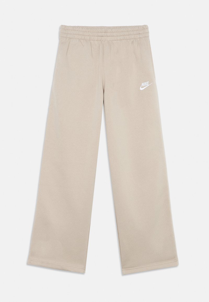 Nike-Sweatpants in Beige mit elastischem Bund, weitem Bein und kleinem weißem Logo auf der linken Seite. Glatte Stoffstruktur.