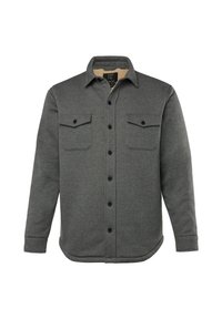 Grå skjorte med lange ærmer, to brystlommer og en blød beige foer. Har en buet kant og en kravedesign.