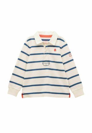 Balta polo krekls ar garām piedurknēm, ar tumši ziliem horizontāliem svītrām, sarkanu izšūtu logotipu uz krūtīm un piedurknēm, kā arī oranžām akcentiem apkaklī un apakšmalā.