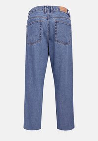 Lichtblauwe denim jeans met een medium hoge taille, voorzien van twee achterzakken, franjes aan de enkels en een leren label op de tailleband.