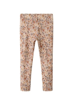 Legginsy dziecięce w beżowej bazie z rozproszonym wzorem kwiatowym w odcieniach brązu, pomarańczu i szarości.