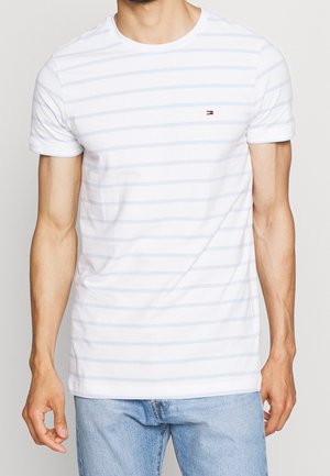 White short-sleeve t-shirt with light blue horizontal stripes, round neckline, featuring a small logo on the chest. Soft cotton fabric.
