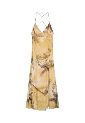 Robe longue jaune à fines bretelles avec imprimé de palmiers et bretelles croisées dans le dos, tissu fluide et légère fente sur le côté.