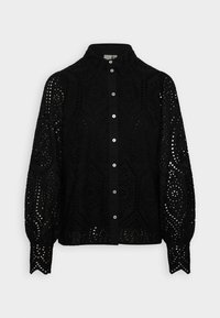 Black long-sleeve shirt with a collared neckline, featuring intricate cut-out patterns and button-down closure. Textured fabric throughout.