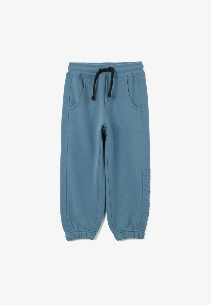Pantalon de survêtement bleu pour enfants avec taille élastique, cordon noir, poches latérales et poignets élastiques.