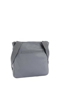Gray crossbody bag made of durable fabric, featuring a zip closure, adjustable strap, and a small back pocket for additional storage.