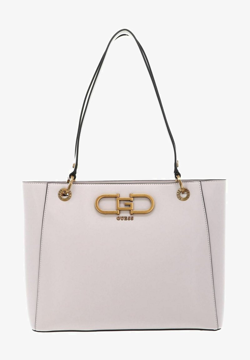 Borsa a tote rosa chiaro con manici in pelle nera, dettagli in oro e logo. Texture liscia, forma strutturata e bordi a contrasto.