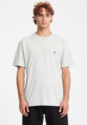 Light gray, short-sleeve t-shirt with a round neckline and a small black logo on the chest. Made of soft, textured fabric.