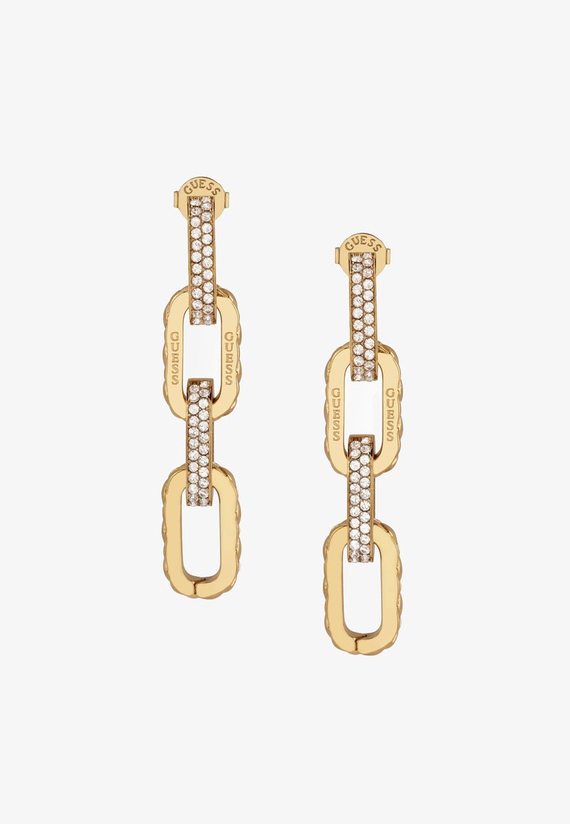 Goldene Kettenanhänger-Ohrringe mit klarem Kristallakzent, versehen mit eingraviertem "GUESS"-Logo und glatter Oberfläche.