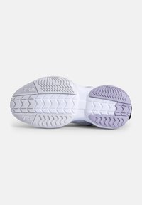 Shoe sole in white and lavender, featuring a textured pattern for grip. Durable rubber material with a curved shape and defined tread.