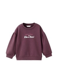Purple sweatshirt with a round neckline and puffed sleeves. Features white text that reads "Shining Bright Like a Bear!" in the center.