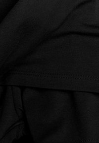 Next Minisvārki - black