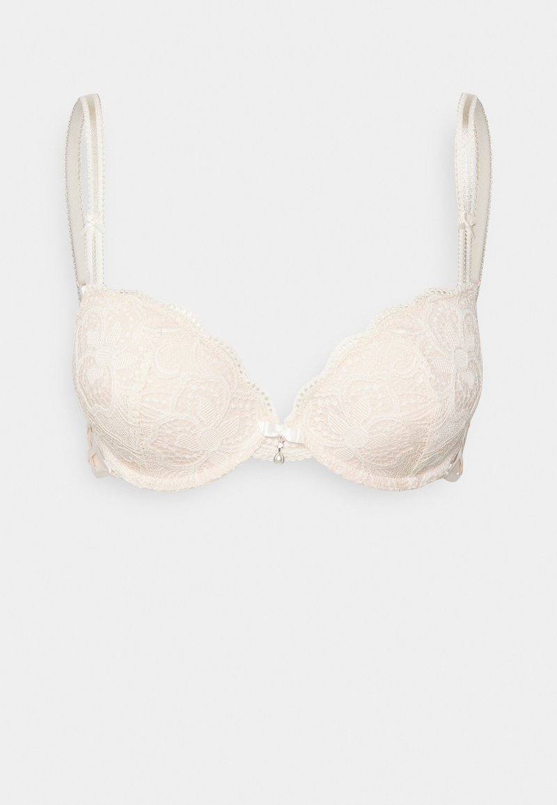 Beiger Spitzen-BH mit gepolsterten Cups, gewellten Kanten, verstellbaren Trägern und einem kleinen Bogen mit einer Perlenakzent in der Mitte.