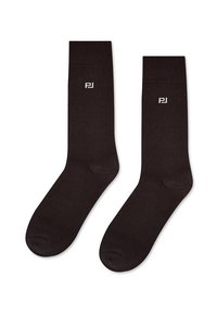 Czarne skarpetki załogowe wykonane z miękkiej tkaniny, z subtelnym białym logo. Gładka faktura, standardowa długość, idealne do codziennego noszenia.
