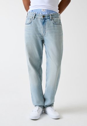 - Jeansy Relaxed Fit