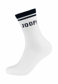 Hvide bomuldsstrømper med ribbet rib og marineblå striber, samt det trykte brandnavn "JOOP!" på forsiden. Modelleret i en vinkel.