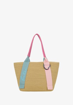 Geweven beige draagtas met brede roze en blauwe handvatten, een blauwe riem met het woord "futva" geborduurd en een decoratieve multicolor ring aan de roze riem.