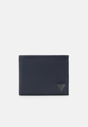 Portafoglio in pelle blu navy con finitura testurizzata, dotato di un accento logo triangolare in argento sul davanti e design minimalista.