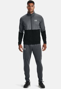 Under Armour TRACK - Verryttelytakki - grey
