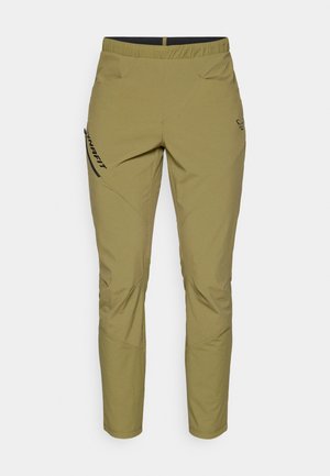 Olivovo zelené vonkajšie nohavice s elastickým pásom, dvoma bočnými vreckami a čiernymi akcentmi, s aerodynamickým dizajnom a textúrovanou tkaninou.