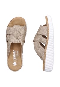 Beige woven fabric slide sandals with crossed straps, a cushioned insole, and a white, ridged outsole. Extra wide design for comfort.