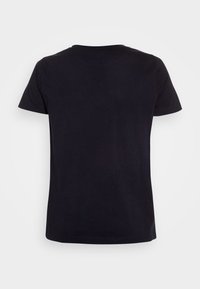 Svart bomullströja med kort ärm, rund halskrage och en slät textur. Visar en enkel, enfärgad design utan mönster.