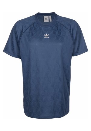 T-shirt bleu marine à manches courtes en tissu texturé présentant un motif en losange, avec un logo adidas blanc sur le devant.