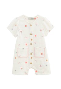 Combinaison en coton blanc avec des manches bouffantes courtes, broderies florales en rose et bleu, boutons au centre, et bords de poches en forme de vagues.