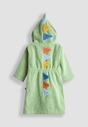Zöld frottír köpeny kapucnival, amelyen színes filc tüskék találhatók narancssárga, kék és sárga színekben a háton és a kapucnin. Gumis derék.