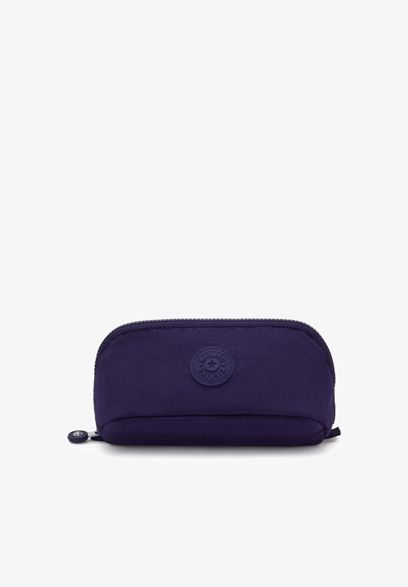 Custodia zip nera compatta di colore viola scuro con parte superiore arrotondata e patch circolare del logo centrato sul davanti.
