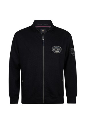 Giacca nera con cerniera realizzata in materiale strutturato, con una toppa rotonda con logo sul petto e polsini e collo a coste.