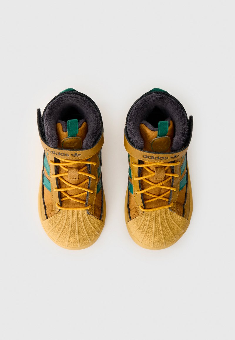 adidas Originals SUPERSTAR TREK UNISEX - Winter boots - bronze-coloured  strata/collegiate green/golden beige/brown - Zalando.co.uk