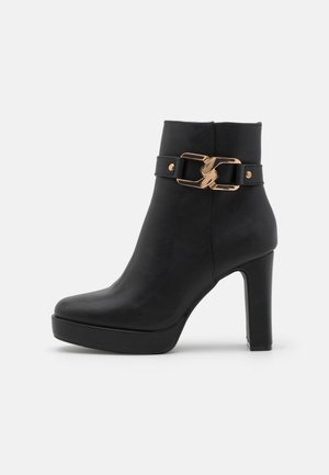 Bottines à talons hauts - black