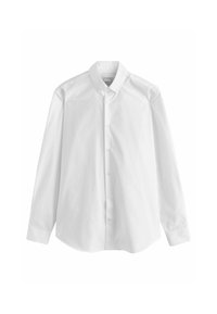 Chemise blanche en coton à manches longues avec un col pointu, fermeture à boutons sur le devant et ourlet arrondi. Texture lisse, sans motifs ni accents.