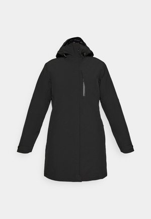 Must-valge veekindel parka, millel on sobiv kapuuts, pikad varrukad ja eesmine tõmblukk. Omab diagonaalset rinnaauku ja küljetaskut.