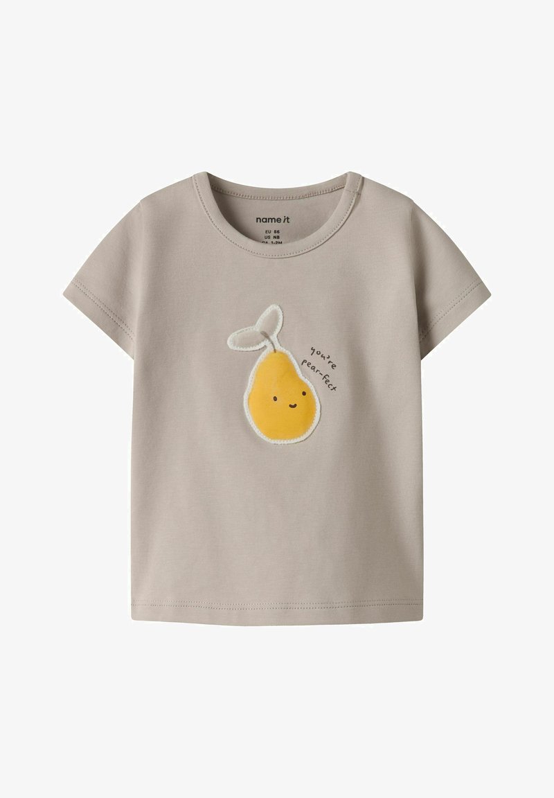 Lysebeige todler T-shirt med et smilende gult pære-grafik og teksten "you're pear-fect" på fronten i midten.