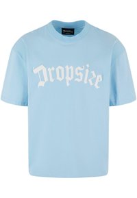 Lyseblåt bomulds t-shirt med korte ærmer, rund halsudskæring og hvidt trykt "Dropsize" tekst i et stiliseret skrifttype på fronten.