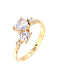 Inel din argint sterling cu ton auriu, prezentând trei pietre prețioase clare: o piatră centrală mare în formă de inimă, înconjurată de două pietre rotunde mai mici.