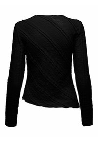 Haut noir à manches longues, ajusté, avec des rayures diagonales texturées et des détails en dentelle subtils, vu de dos.