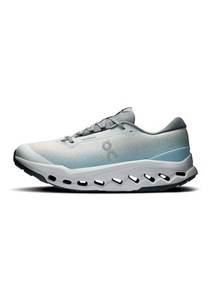 Light blue and white athletic running shoe with grey laces, mesh upper, and thick ventilated sole featuring oval cut-out holes.